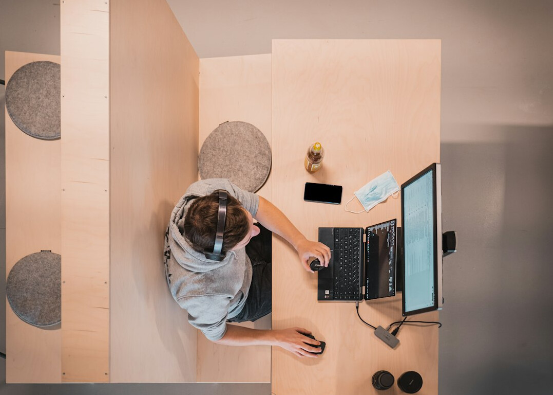 woman working on code at desk