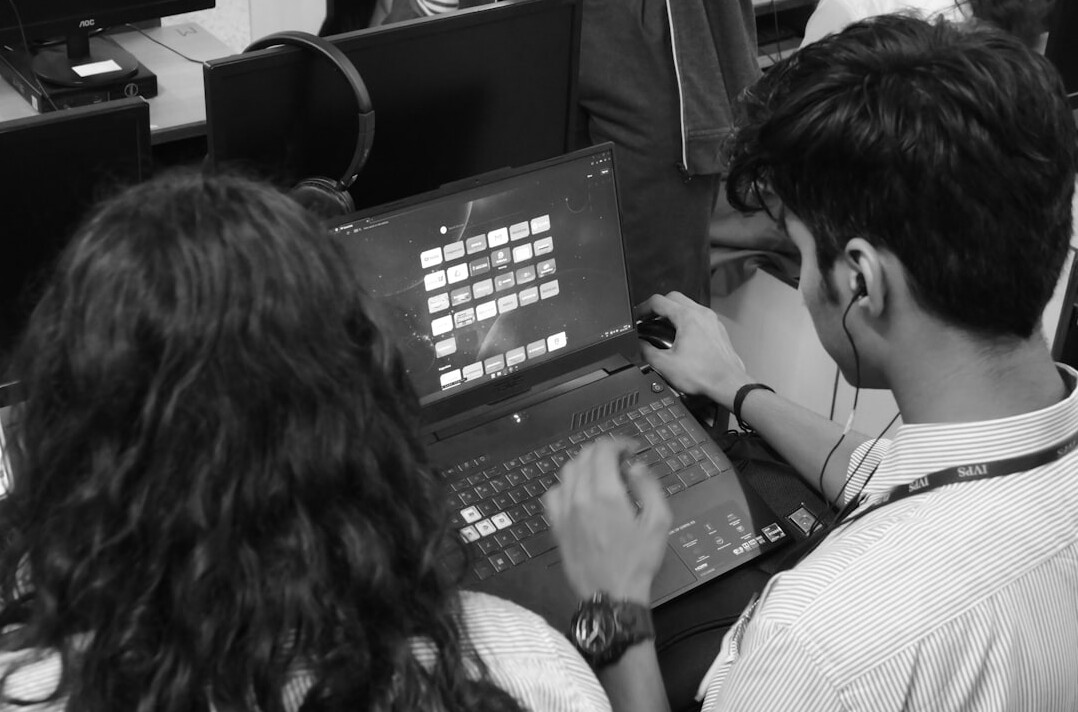diverse students learning programming