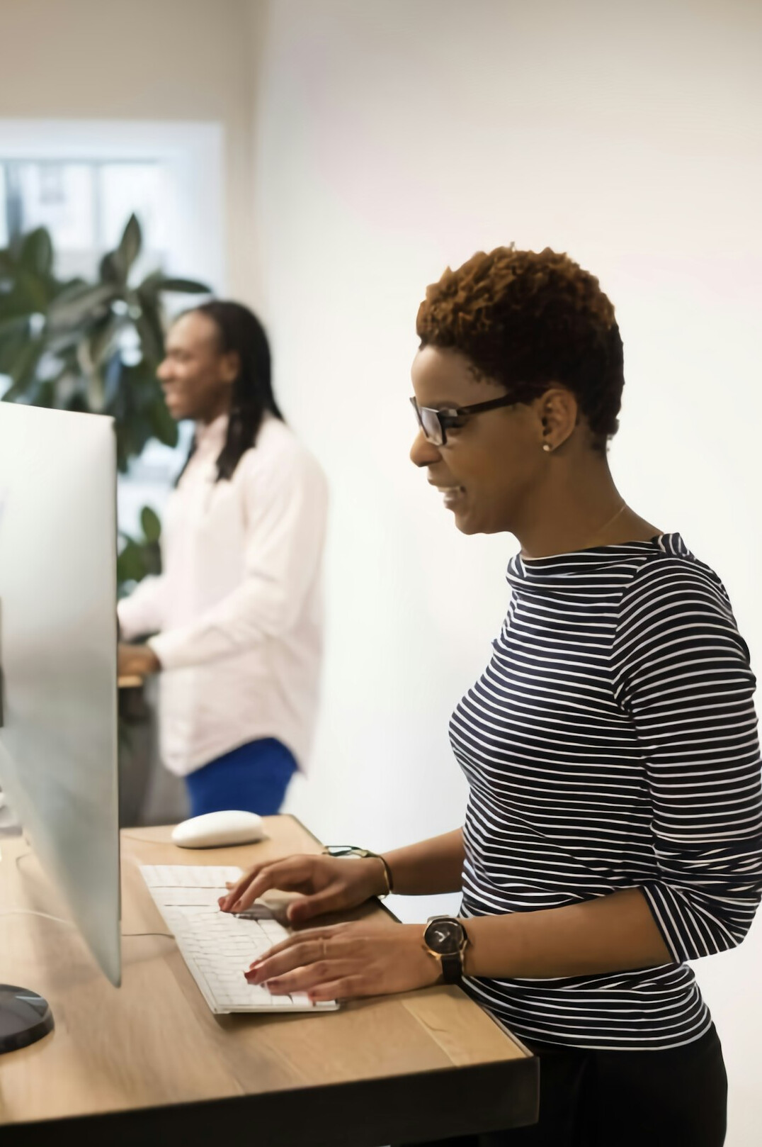 diverse team working on computers